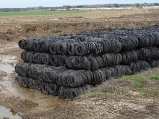 Bundled old car tyres